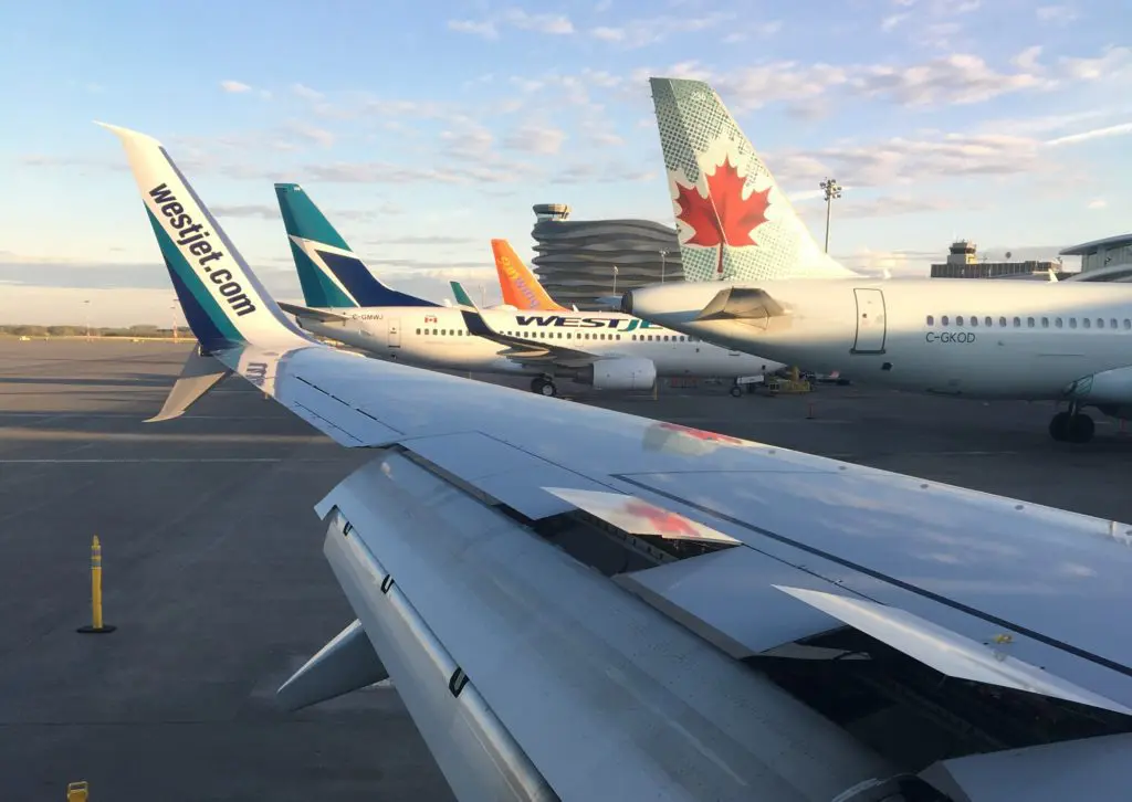 Planes lined up at EIA with Tower in background