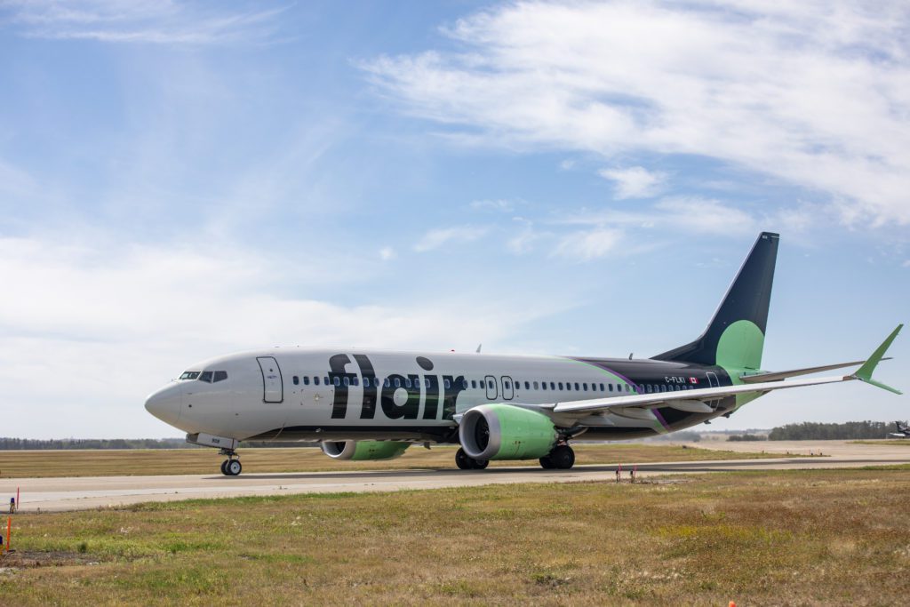 Photo of a Flair passenger plane on the YEG runway.