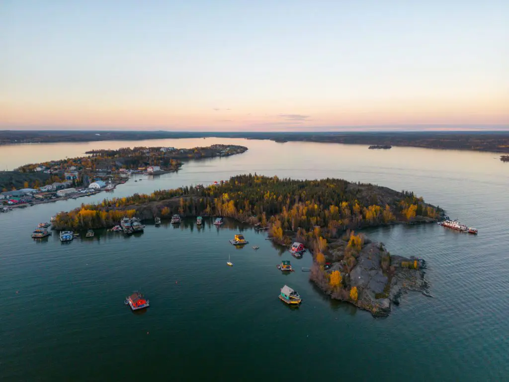 Island with boats and sunset