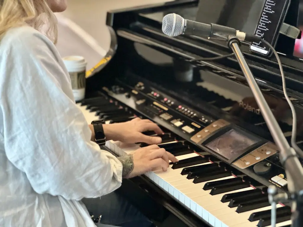 Close up of hands on piano keys