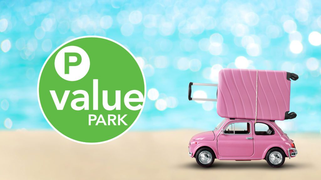 Value Park logo on beach with toy car and suitcase