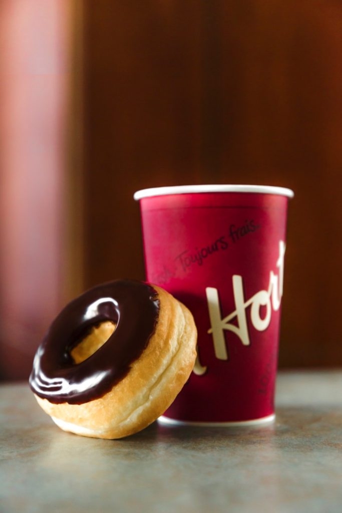 Photo of Chocolate Glazed Donut and Tim Hortons Cup